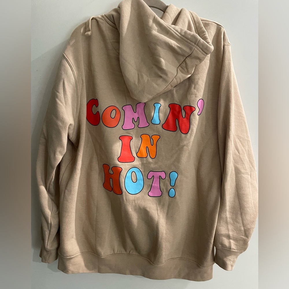 Camel color hoodie with colorful words on back